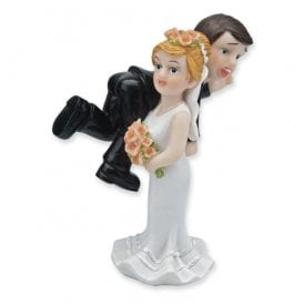 Bride Carrying Groom Over Shoulder
