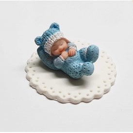 Baby Boy with Head on Pillow